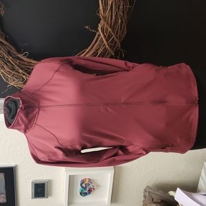 RBX full-zip athletic jacket with thumb holes, and zipper pockets. Size Medium